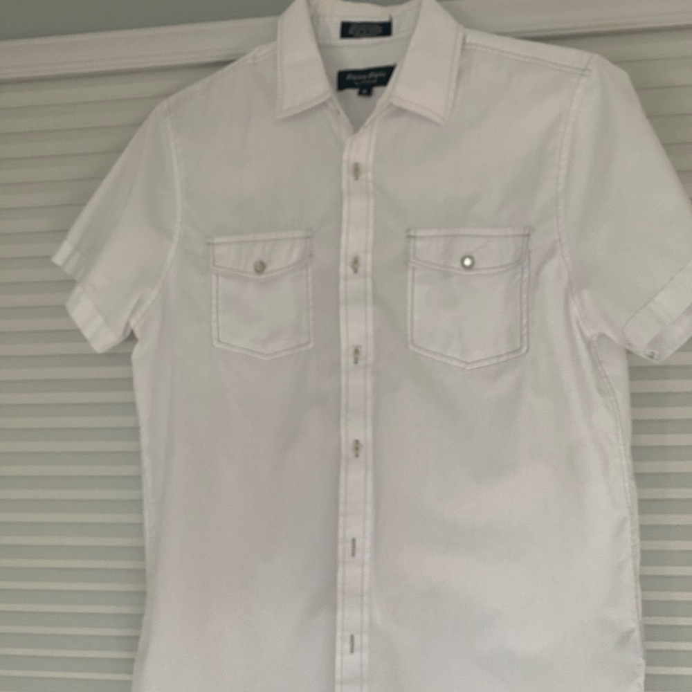 medium young man, white button down shirt